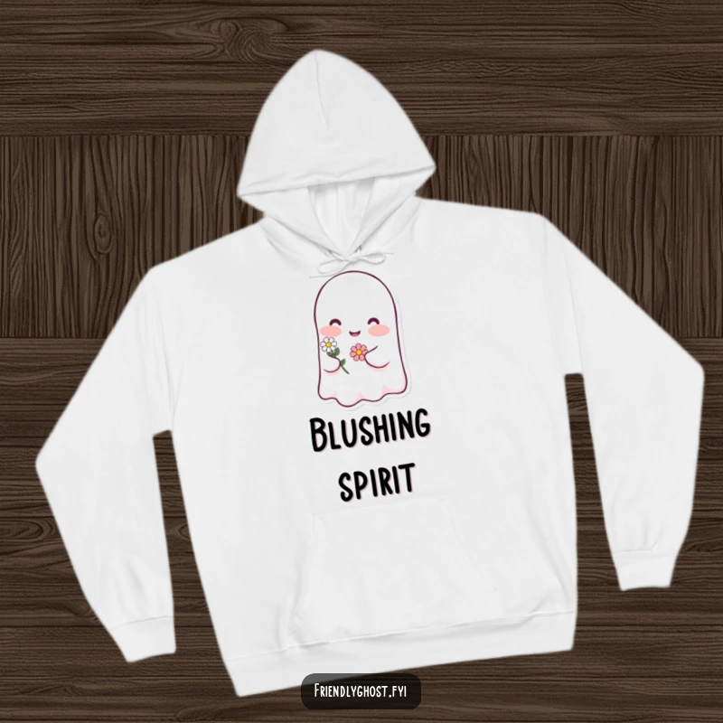Funny ghost blush hoodie with a happy character blushing pink and holding a tiny flower, a warm and humorous apparel gift.